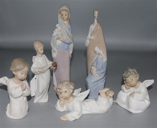 Four Lladro angels and two figures